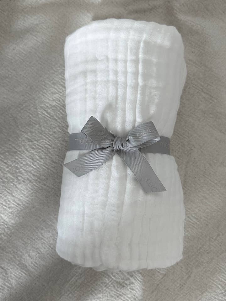 Moccy Moo cuddly swaddle